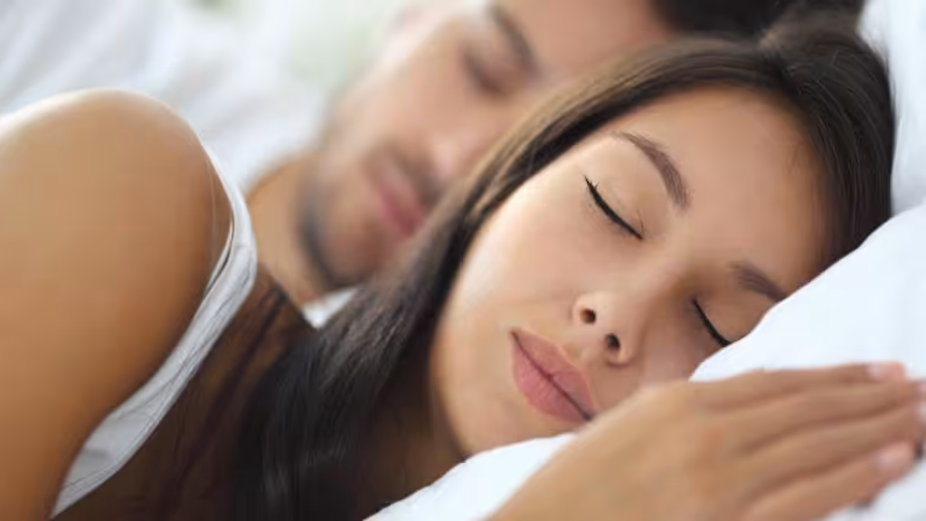 Asian Couple Sleeping Peacefully