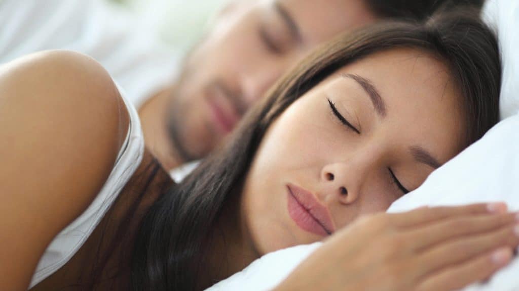 Asian Couple Sleeping Peacefully