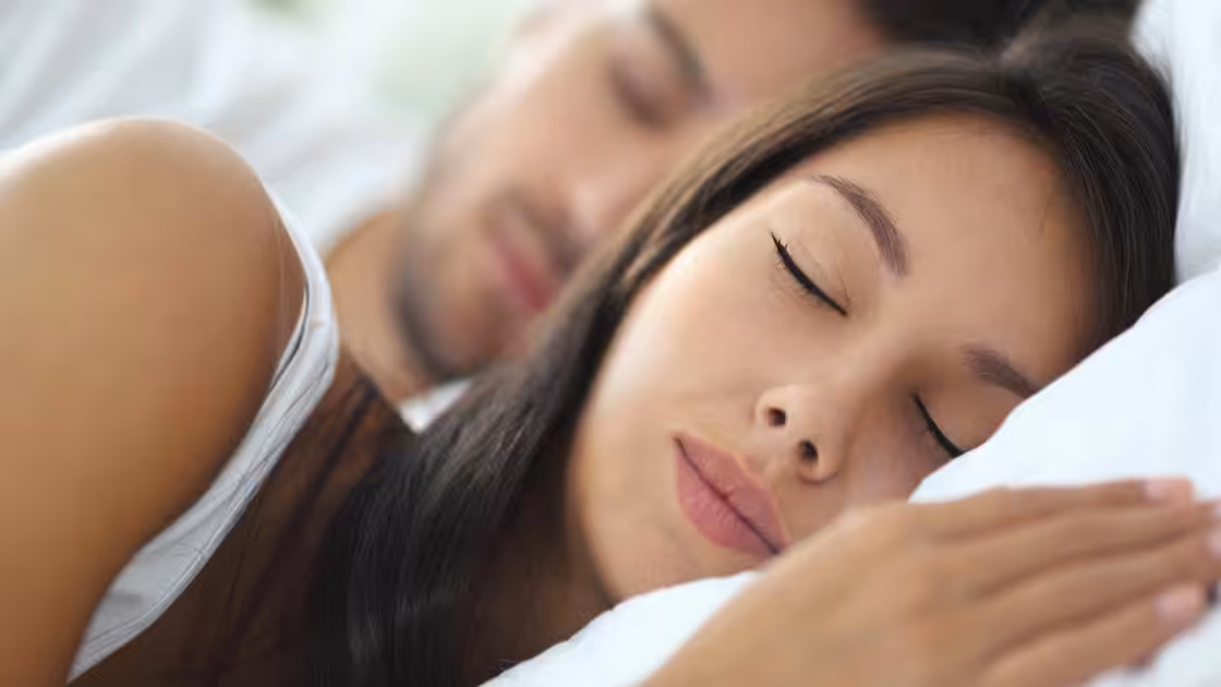 Asian Couple Sleeping Peacefully